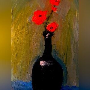 Flowers in Black Bottle.